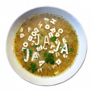 Plato de sopa de letras donde se puede leer JA JA JA